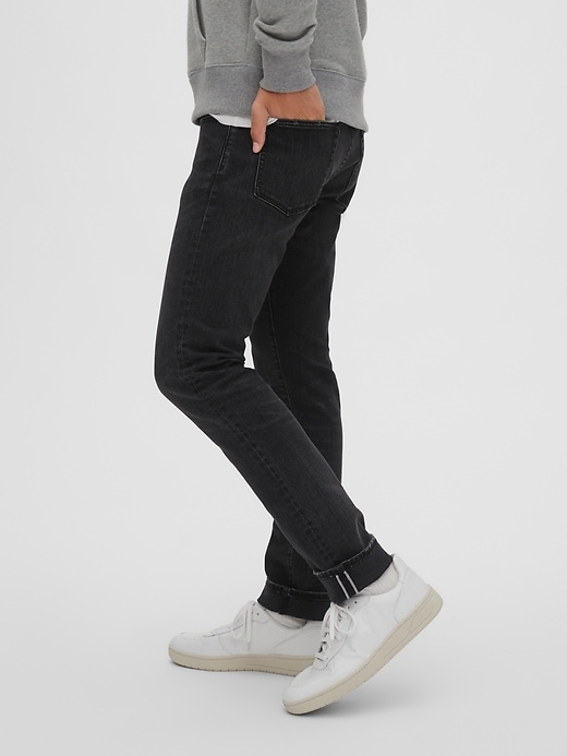1 of 8 showing, with the color midnight oil of product Selvedge Slim Jeans with GapFlex