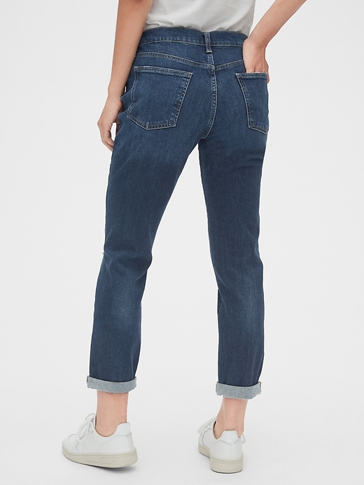 2 of 8 showing, with the color tinted medium destroy of product Mid Rise Distressed Girlfriend Jeans