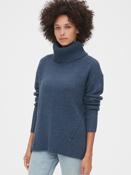 1 of 8 showing, with the color worn medium blue of product Brushed Turtleneck Sweater