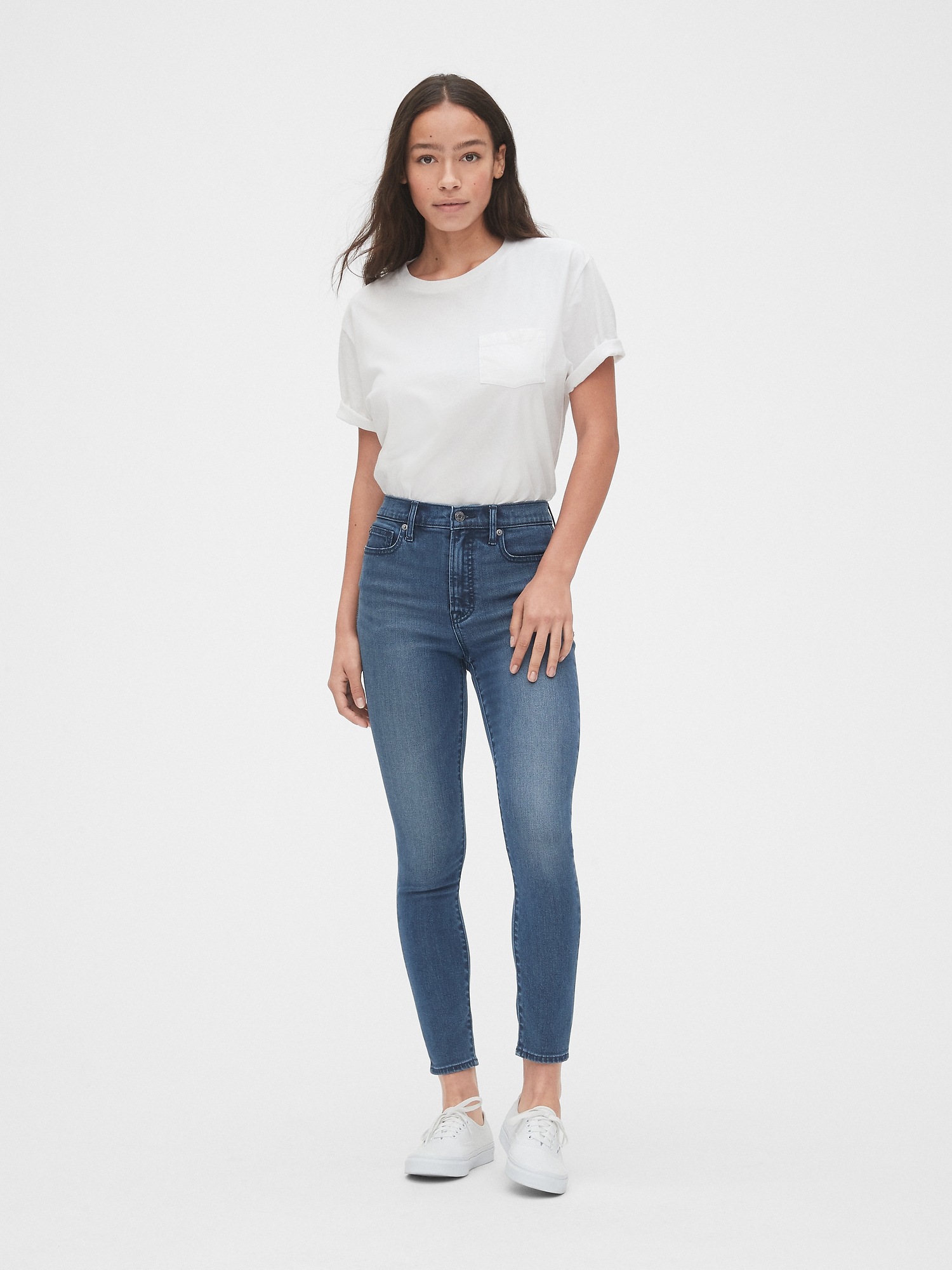 skinny girl in high waisted jeans