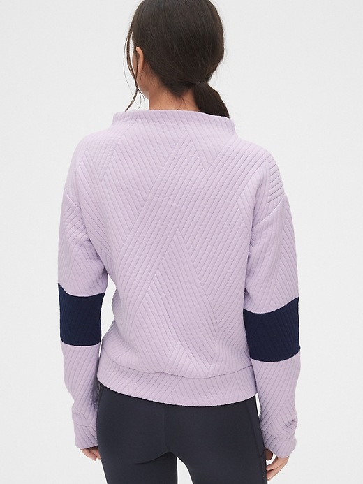 View large product image 2 of 6. GapFit Colorblock Jacquard Quilted Mockneck Sweatshirt
