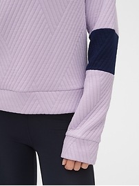 View large product image 5 of 6. GapFit Colorblock Jacquard Quilted Mockneck Sweatshirt