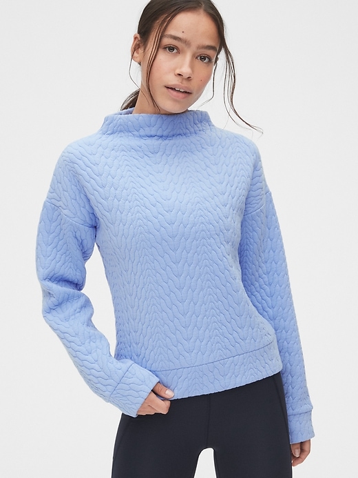 View large product image 1 of 6. GapFit Jacquard Mockneck Sweatshirt