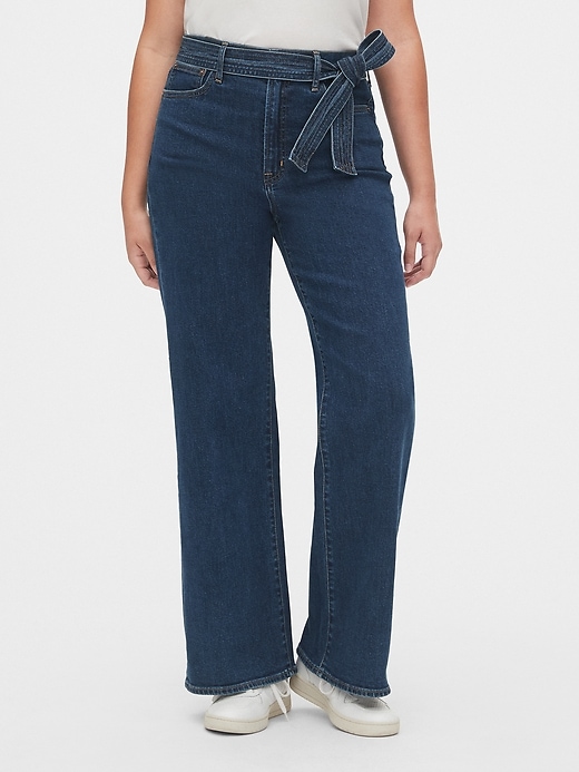 1 of 8 showing, with the color dark indigo of product High Rise Tie-Belt Denim Trousers with Secret Smoothing Pockets