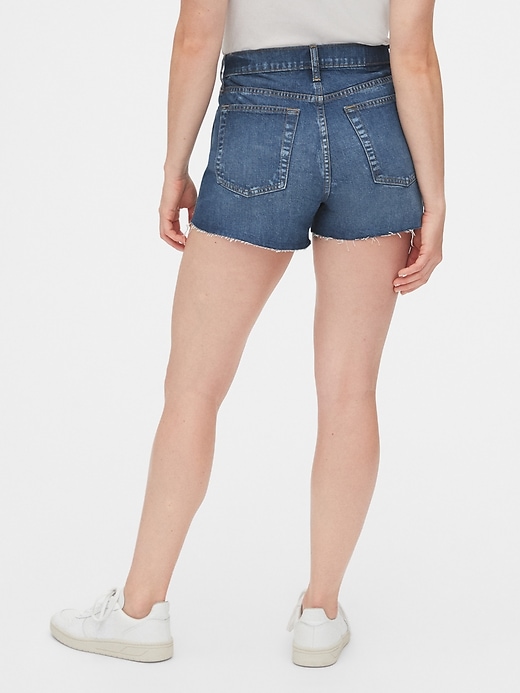 Image number 2 showing, High Rise Cheeky Denim Shorts with Raw Hem