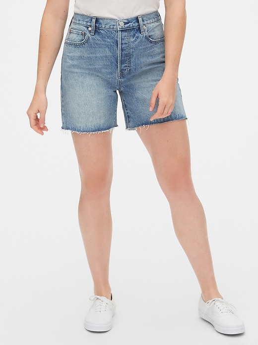 1 of 8 showing, with the color light indigo of product Mid Rise Boyfriend Shorts with Raw Hem