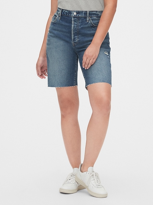 1 of 8 showing, with the color dark indigo of product High Rise Distressed Denim Bermuda Shorts