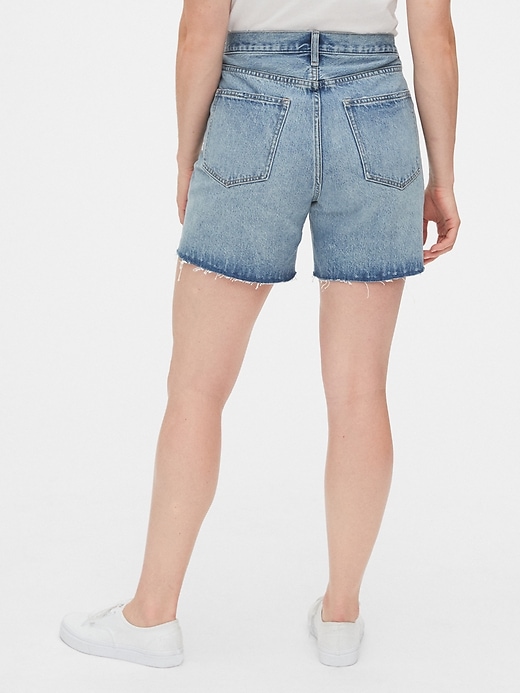 2 of 8 showing, with the color light indigo of product Mid Rise Boyfriend Shorts with Raw Hem