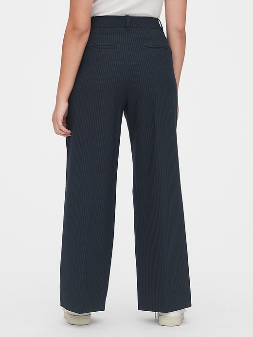 2 of 8 showing, with the color navy blue pinstripe of product High Rise Pleated Stripe Wide-Leg Pants