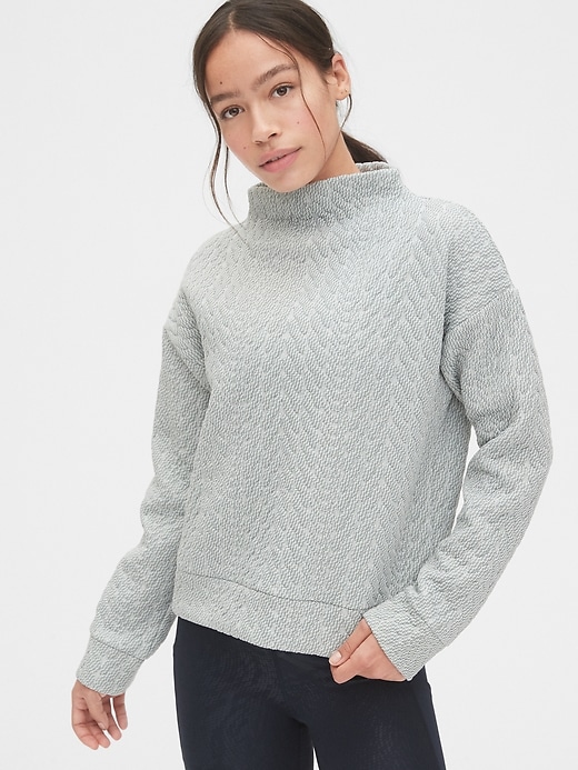 View large product image 1 of 1. GapFit Jacquard Mockneck Sweatshirt