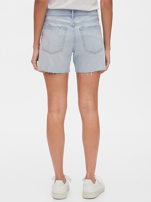 2 of 8 showing, with the color light indigo of product 5" Mid Rise Denim Shorts