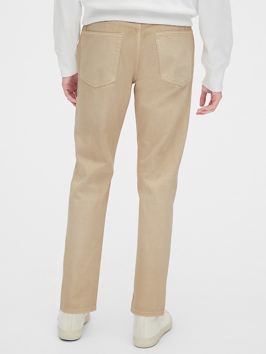 2 of 8 showing, with the color desert khaki of product Garment-Dyed Slim Jeans