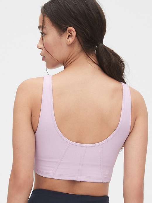 2 of 8 showing, with the color purple lilac of product GapFit Blackout Corset-Style Sports Bra