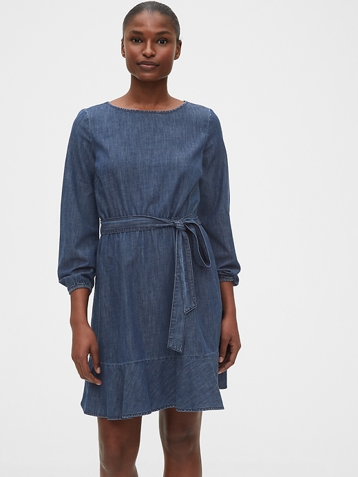 1 of 8 showing, with the color medium indigo of product Tie-Belt Mini Denim Dress