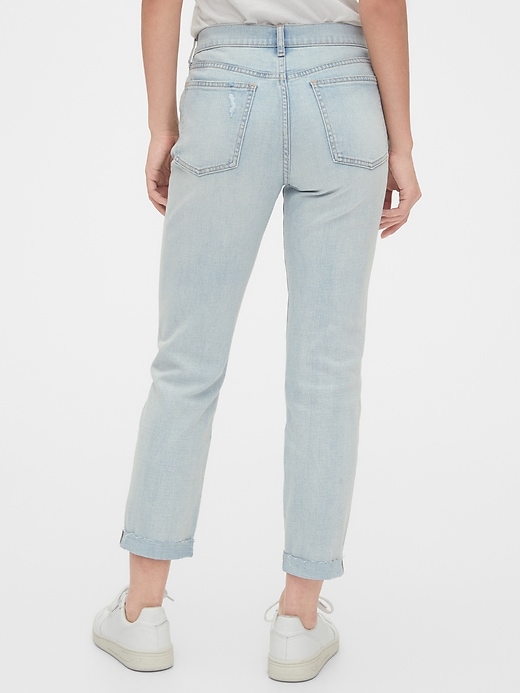 2 of 8 showing, with the color light indigo of product Mid Rise Girlfriend Jeans With Washwell™
