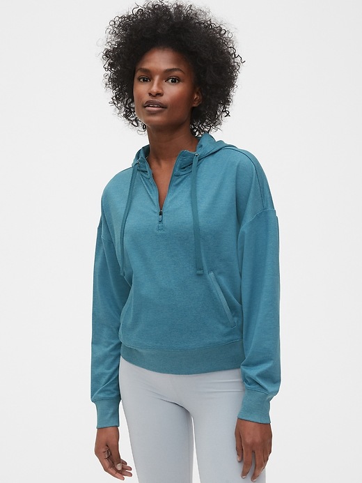 View large product image 1 of 1. GapFit Half-Zip Hoodie in Brushed Jersey