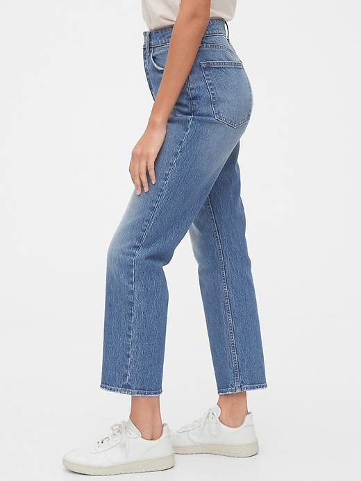 1 of 8 showing, with the color medium indigo of product High Rise Curvy Cheeky Straight Jeans