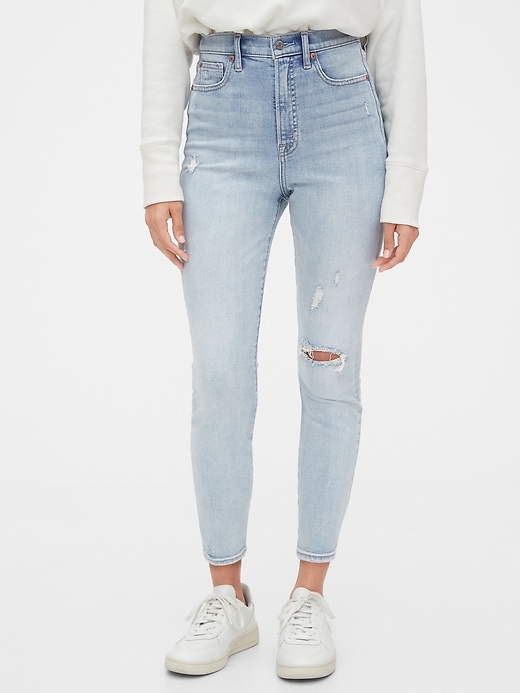 1 of 8 showing, with the color light indigo destroy of product Sky High Destructed True Skinny Ankle Jeans
