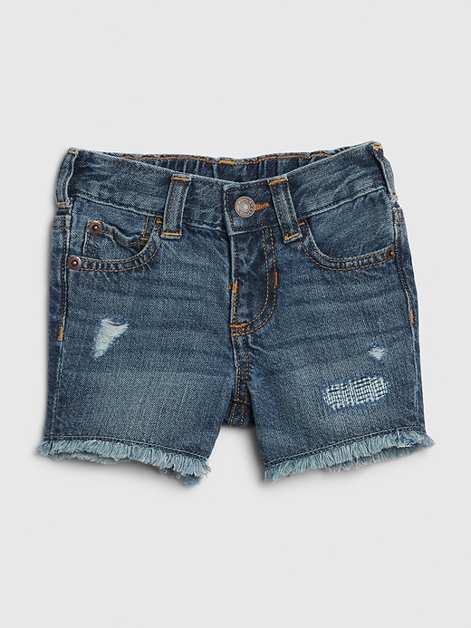 1 of 8 showing, with the color dark wash indigo of product Baby Destructed Denim Shorts