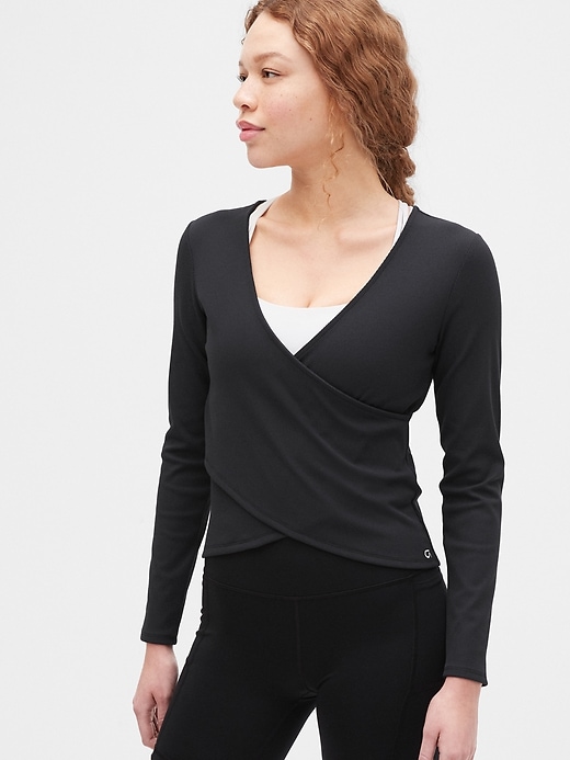 View large product image 1 of 6. GapFit Blackout Rib Long Sleeve Wrap Front Top
