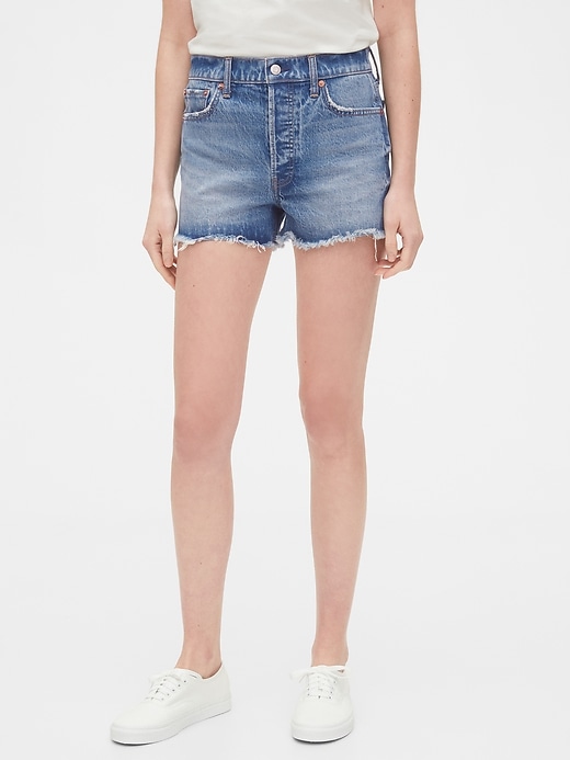 View large product image 1 of 1. High Rise Cheeky Denim Shorts with Raw Hem
