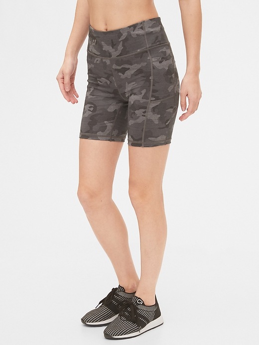 1 of 8 showing, with the color black camo of product GapFit High Rise 7" Blackout Biker Shorts