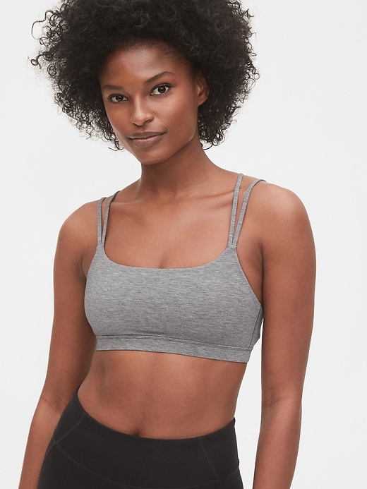 1 of 8 showing, with the color heather grey of product GapFit Breathe Low Support Strappy Sports Bra