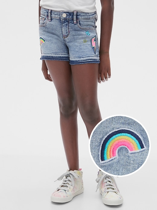 1 of 8 showing, with the color medium wash of product Kids Embroidered Patch Denim Shortie Shorts