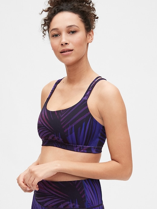 1 of 8 showing, with the color blue indigo palm print of product GapFit Eclipse Medium Support Strappy Sports Bra