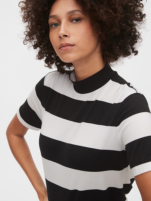 1 of 8 showing, with the color black stripe of product Striped Mockneck Top