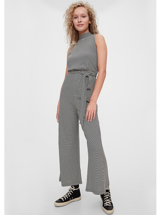 View large product image 1 of 1. Sleeveless Mockneck Jumpsuit