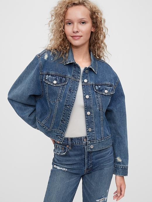1 of 8 showing, with the color medium indigo of product Distressed Denim Dolman Icon Jacket With Washwell™