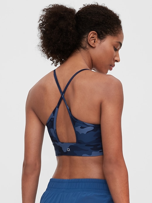 2 of 8 showing, with the color blue camo of product GapFit Low Impact Racerback Blackout Sports Bra