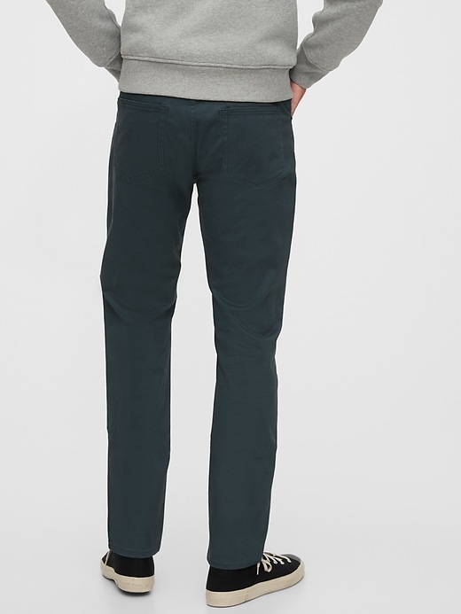 2 of 8 showing, with the color tapestry teal green of product Soft Wear Slim Jeans with GapFlex