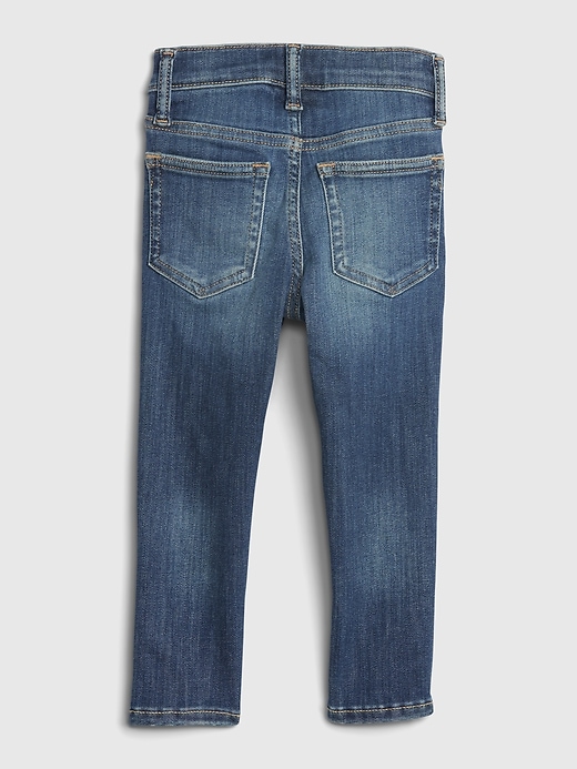 2 of 8 showing, with the color dark wash of product Toddler Skinny Jeans with Washwell™