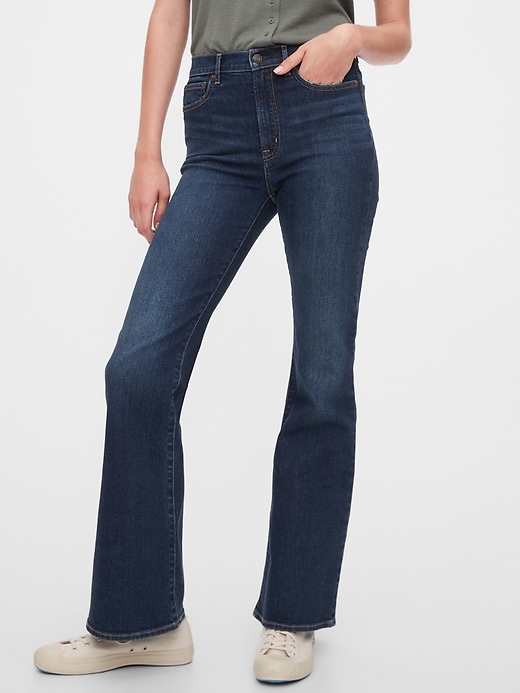 1 of 8 showing, with the color dark indigo of product High Rise Flare Jeans with Washwell™