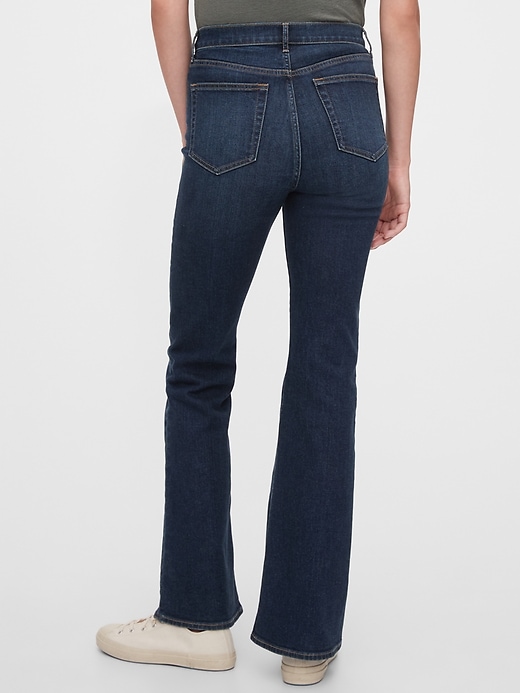 2 of 8 showing, with the color dark indigo of product High Rise Flare Jeans with Washwell™