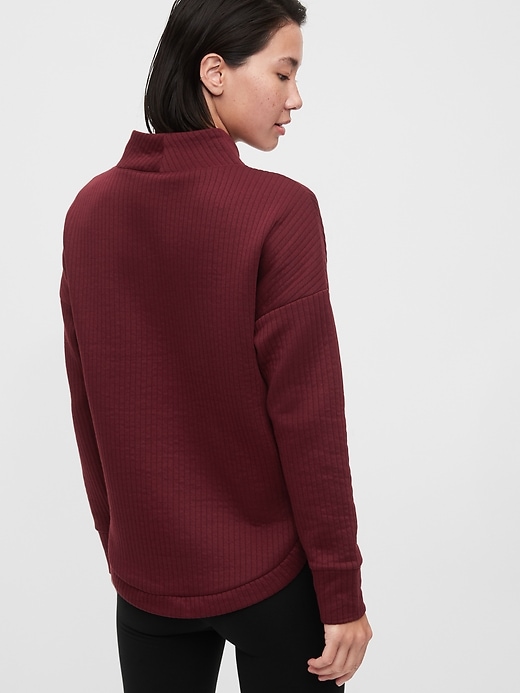 2 of 8 showing, with the color shiraz red of product GapFit Mockneck Jacquard Sweatshirt
