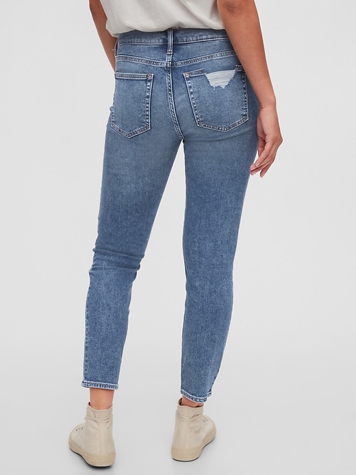 2 of 8 showing, with the color light indigo destroy of product Mid Rise True Skinny Jeans with Washwell