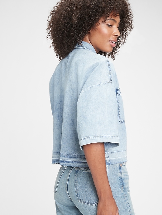 2 of 8 showing, with the color light indigo of product Boxy Cropped Denim Shirt