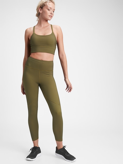1 of 8 showing, with the color olive green of product GapFit High Rise Eclipse Honeycomb 7/8 Leggings