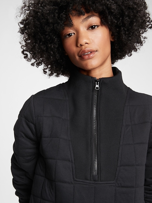 1 of 8 showing, with the color true black of product GapFit Quilted Jacquard Half-Zip Sweatshirt