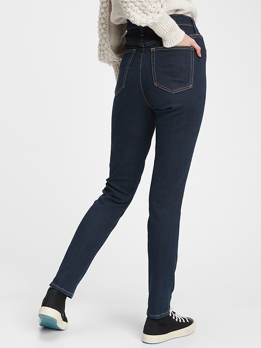 Image number 2 showing, High Rise True Skinny Jeans with Secret Smoothing Pockets