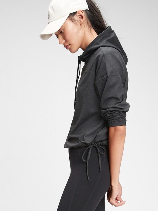 View large product image 1 of 6. GapFit Brushed Tech Jersey Side-Tie Hoodie