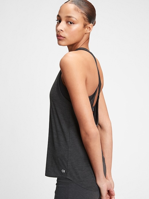View large product image 1 of 1. GapFit Brushed Tech Jersey Crossback Tank Top