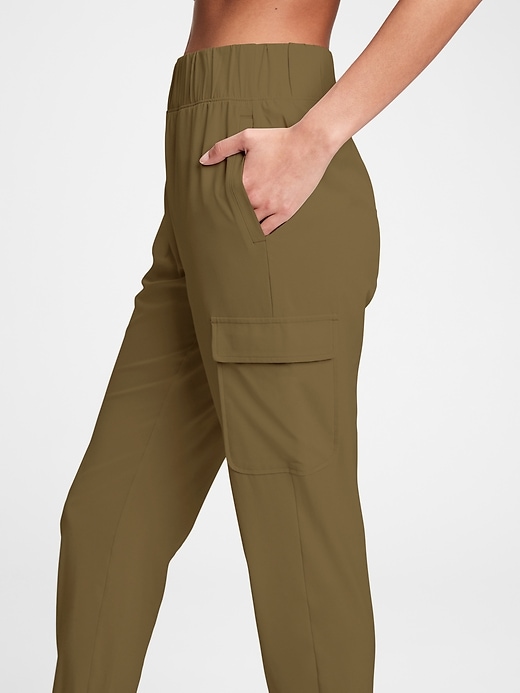 1 of 8 showing, with the color olive green of product GapFit Recycled Runaround Cargo Joggers