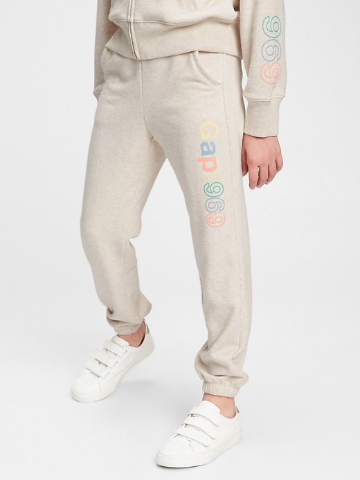2 of 8 showing, with the color oatmeal of product Kids Slouchy Gap Logo Joggers