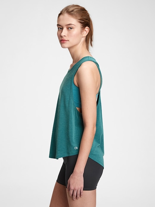 1 of 8 showing, with the color peacock green of product GapFit Breathe Muscle Tank Top