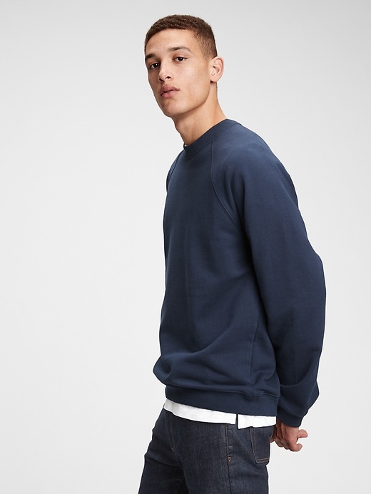 1 of 8 showing, with the color new classic navy of product French Terry Raglan Crewneck Sweatshirt