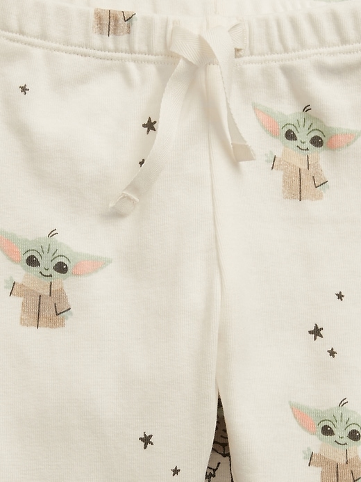 2 of 8 showing, with the color new off white of product babyGap &#124 Star Wars™ Graphic Pull-On Pants (3-Pack)